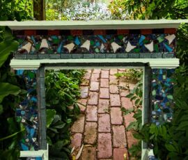 upcycled old mantle piece in garden path, decorative, cool tones